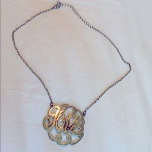 Gold “Love” Necklace